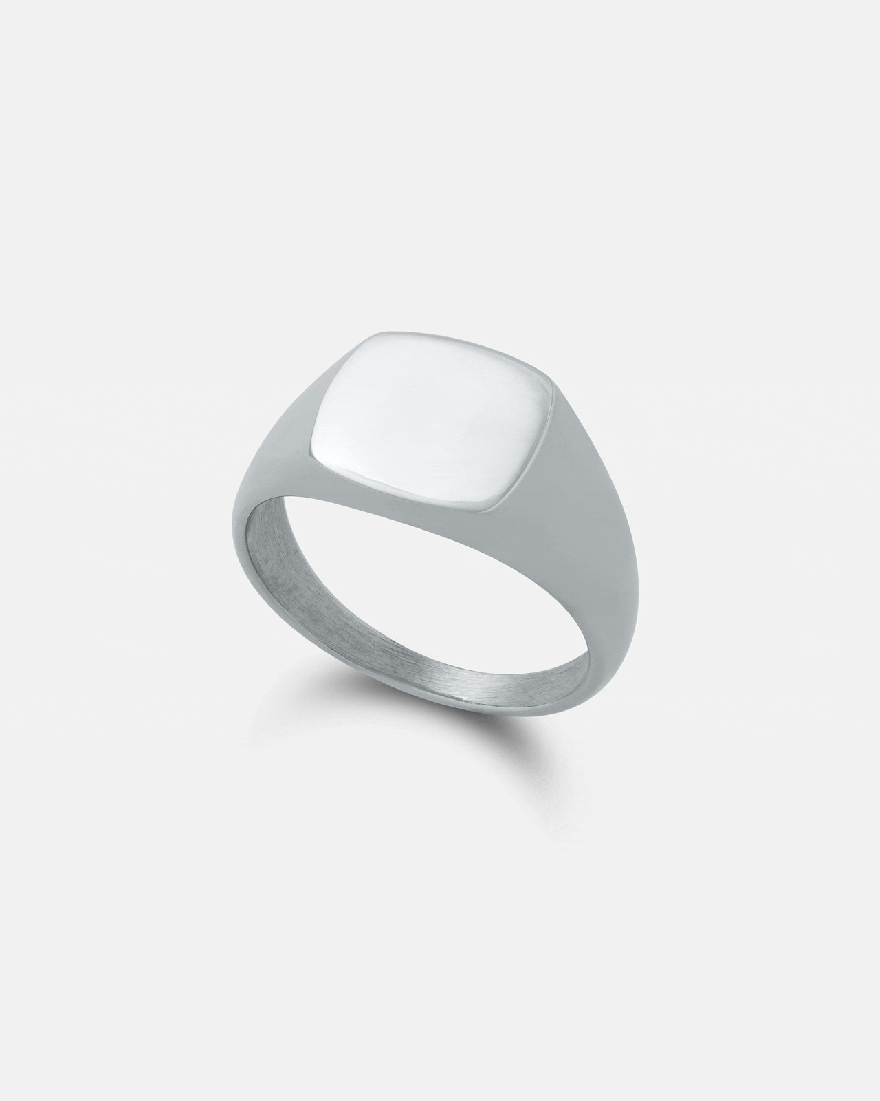 The Minimal Signet Ring by Statement Collective, featuring a smooth, flat, square-shaped silver top, is displayed against a plain white background.