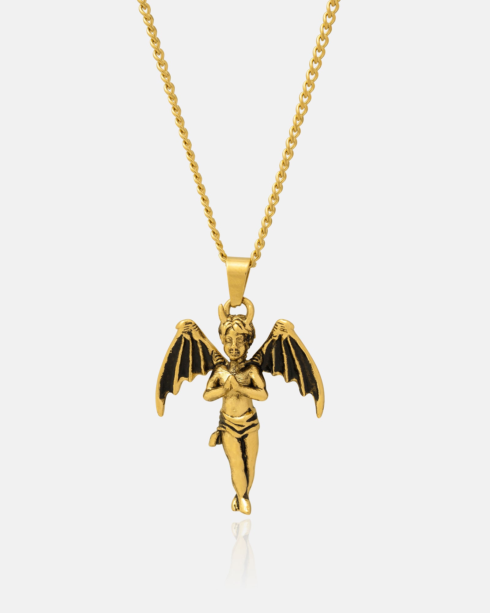 Make a statement with "The Wicked One" Pendant (Gold)—an 18k gold-plated chain necklace featuring a winged angel pendant with black-accented wings, arms crossed, and head slightly tilted for bold gothic style.