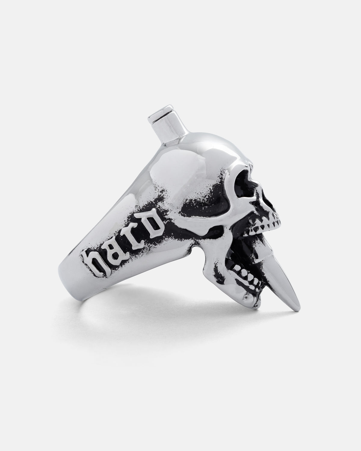 Statement Collective Bite The Bullet ring featuring a stainless steel skull biting a bullet with hard engraved on the side.