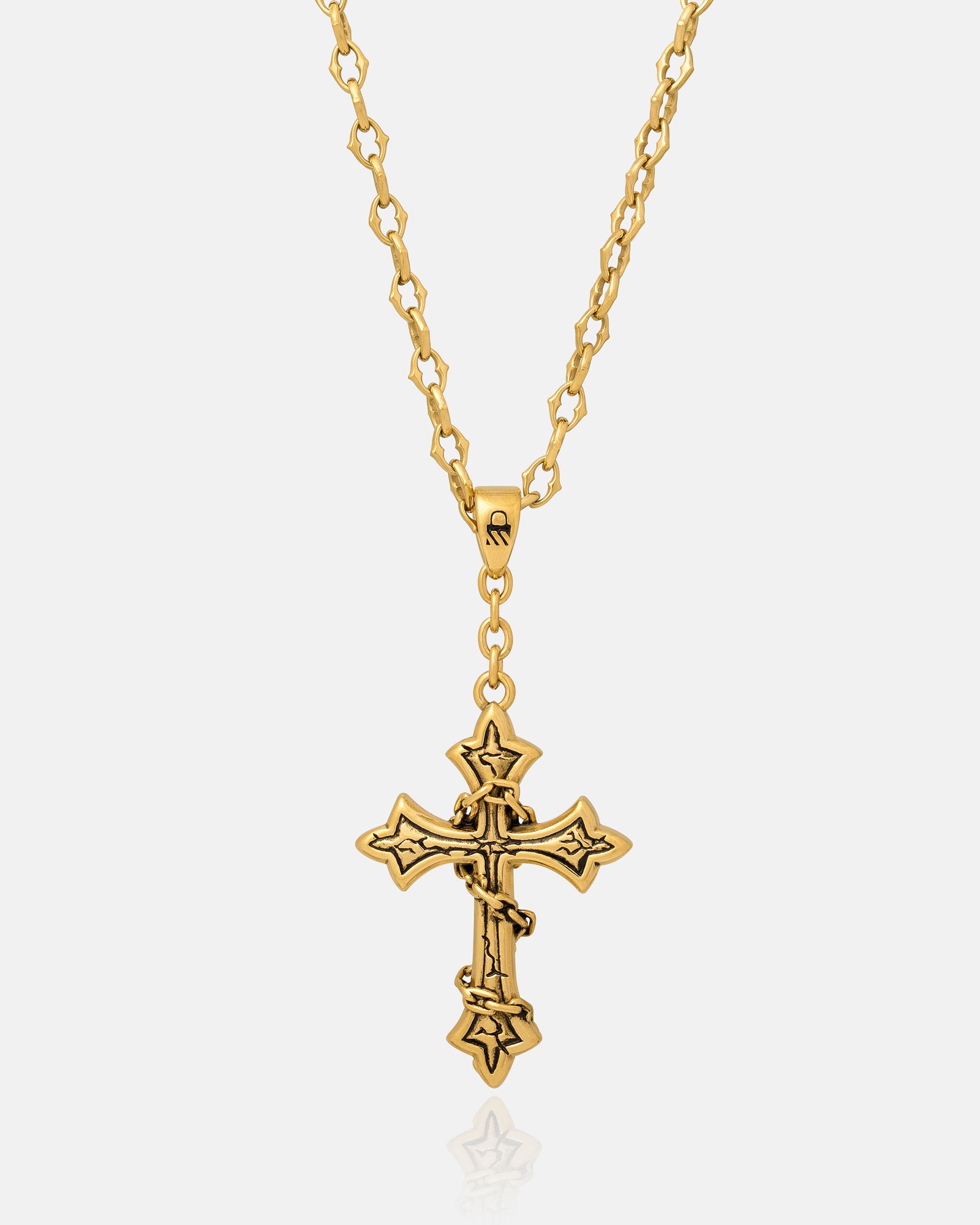The Cathedral" 6mm Spiked Chain in gold features a decorative gothic design with ornate, pointed details and a detailed custom cross pendant, all set against a white background. Choose your own pendant style.