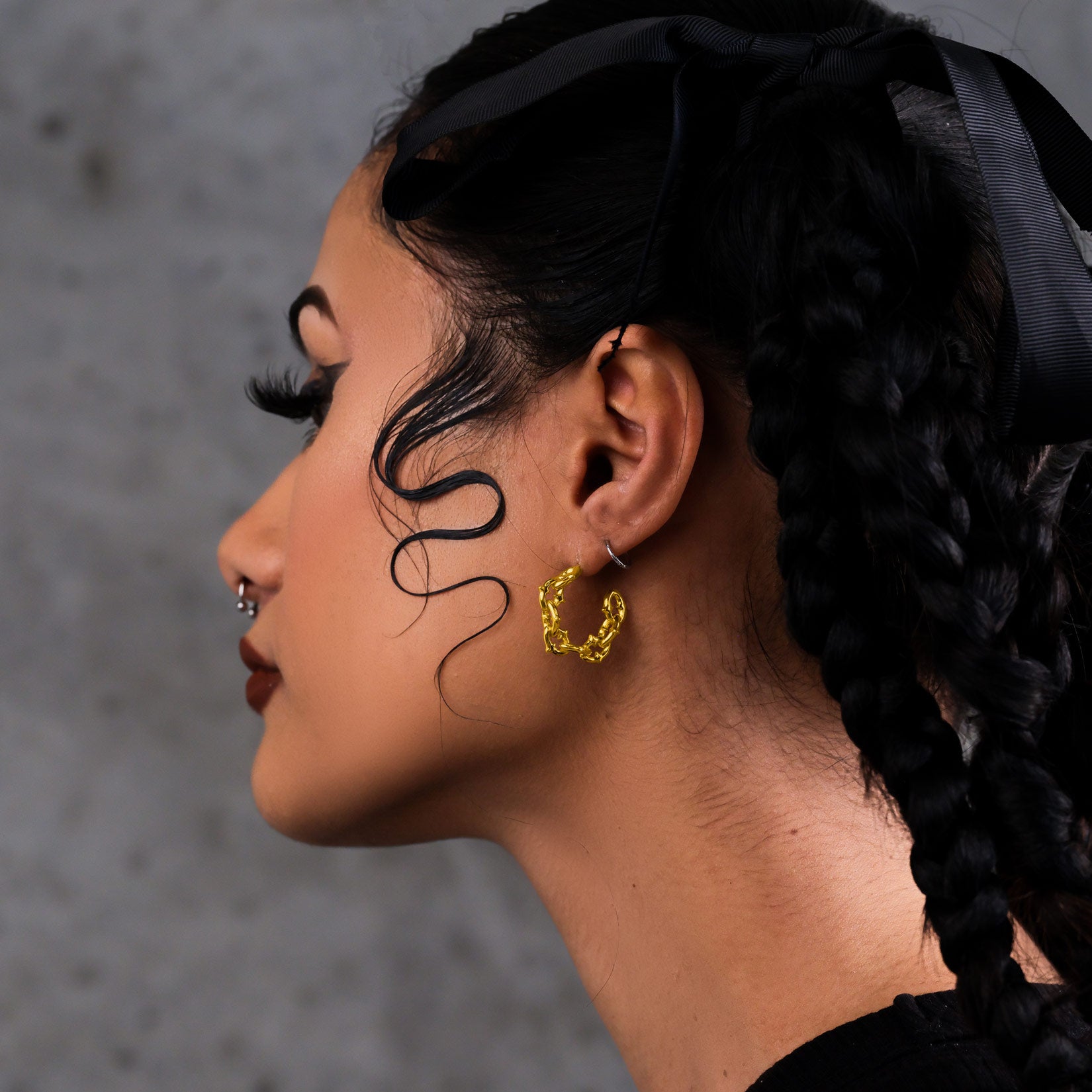 Women's gold punk hoop earrings with spikes