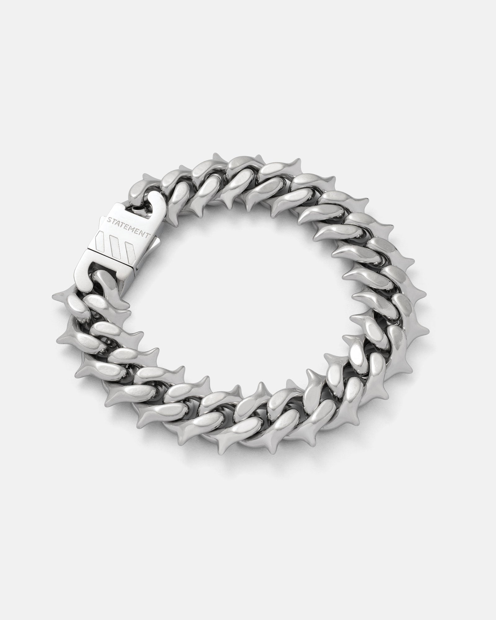 Silver 11mm Spiked Cuban Bracelet with straight spikes moulded in by statement collective on grey background