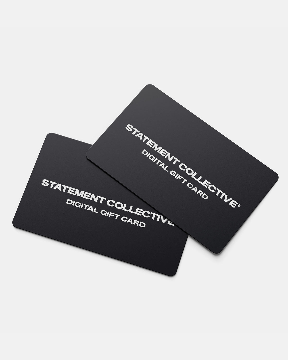 Two black Statement Collective Gift Cards with white text, slightly overlapping on a white background. The perfect way to give the gift of choice.