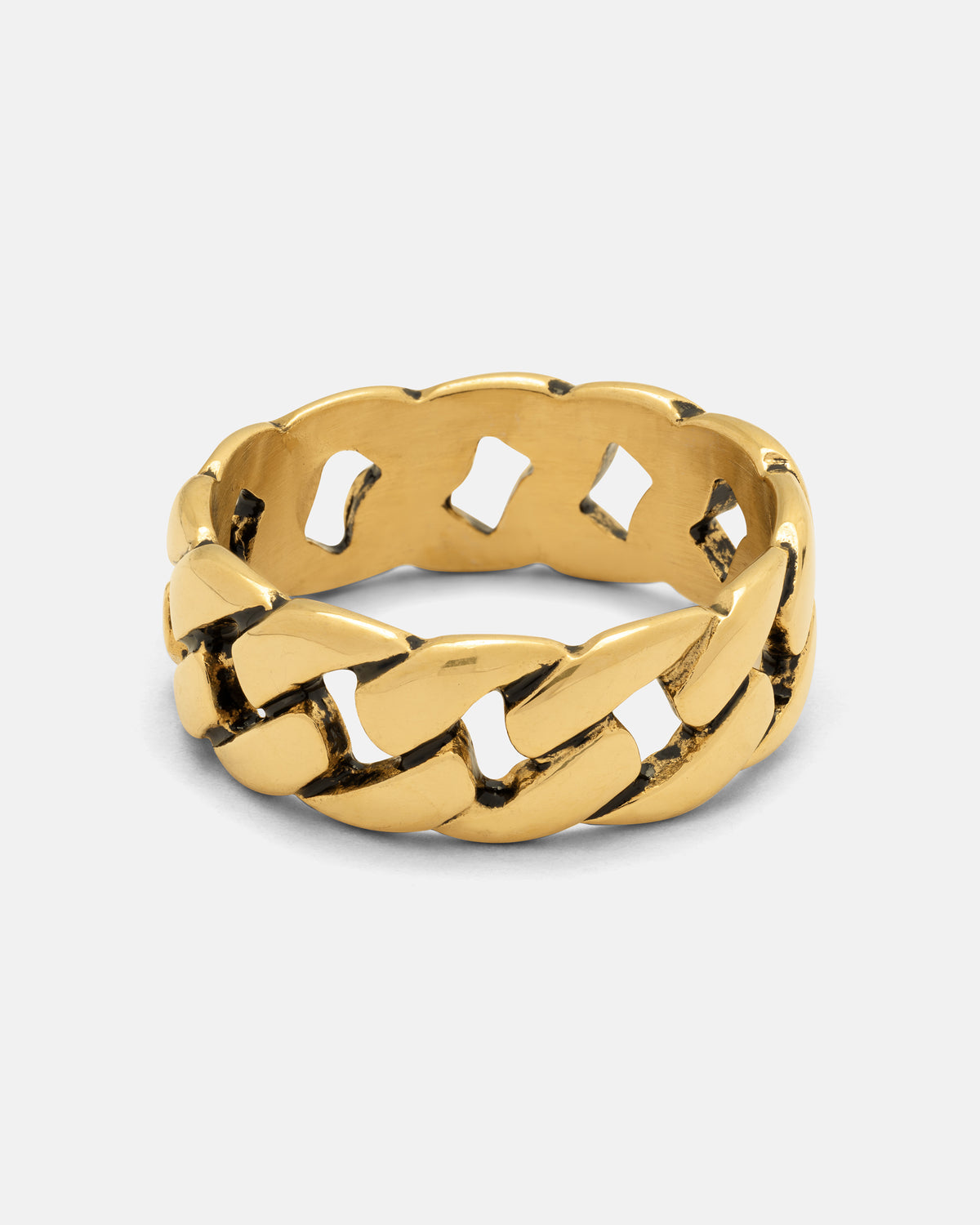 The Statement Collective Cuban Link Ring (Gold) features a bold, thick interlocking band design crafted from 18k gold, showcased against a simple light backdrop.