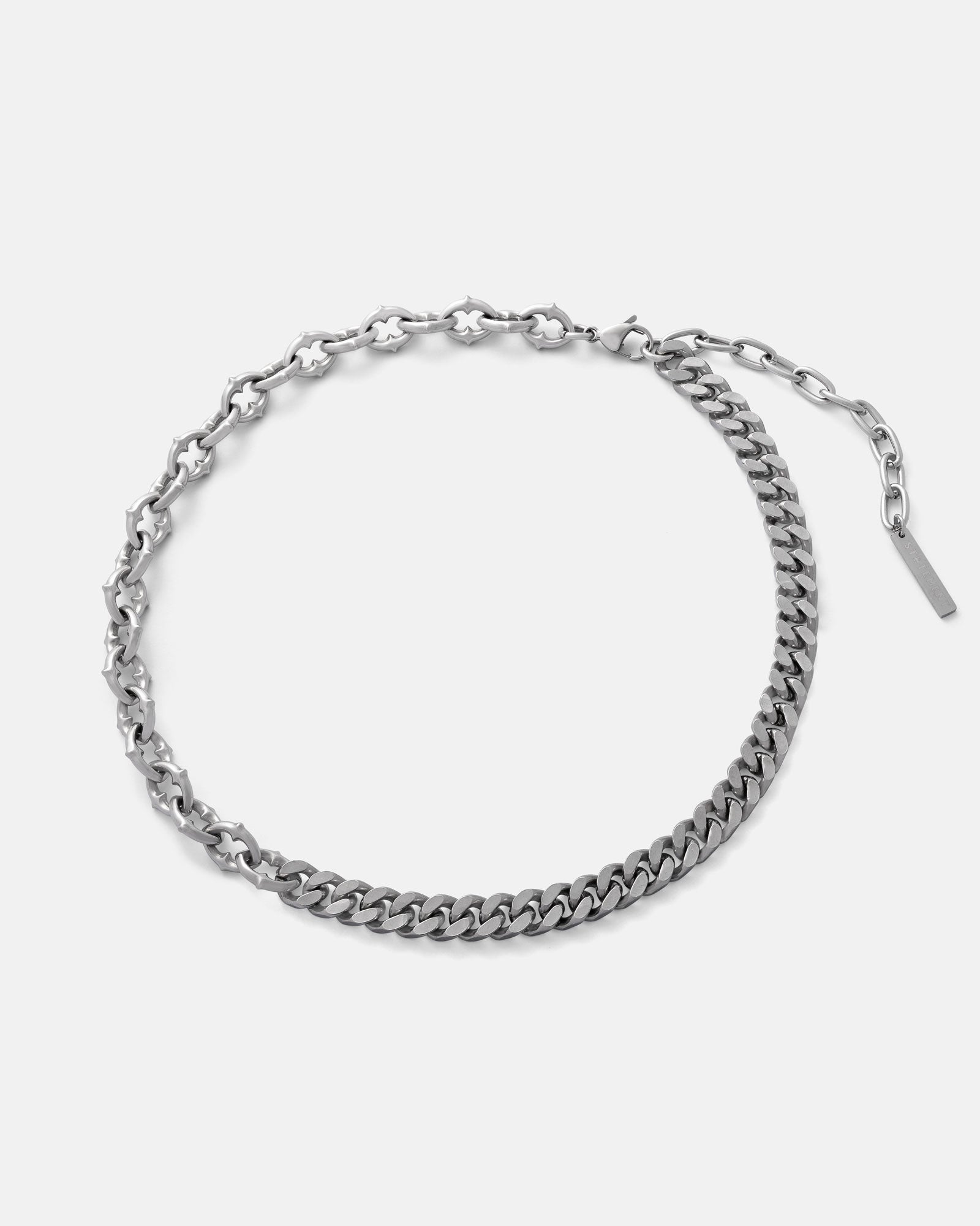 The "Split" Cathedral Cuban Chain (Adjustable) is a silver necklace with one half of interlocking X links and the other half in classic Cuban style, finished with an adjustable clasp and a short chain tail.