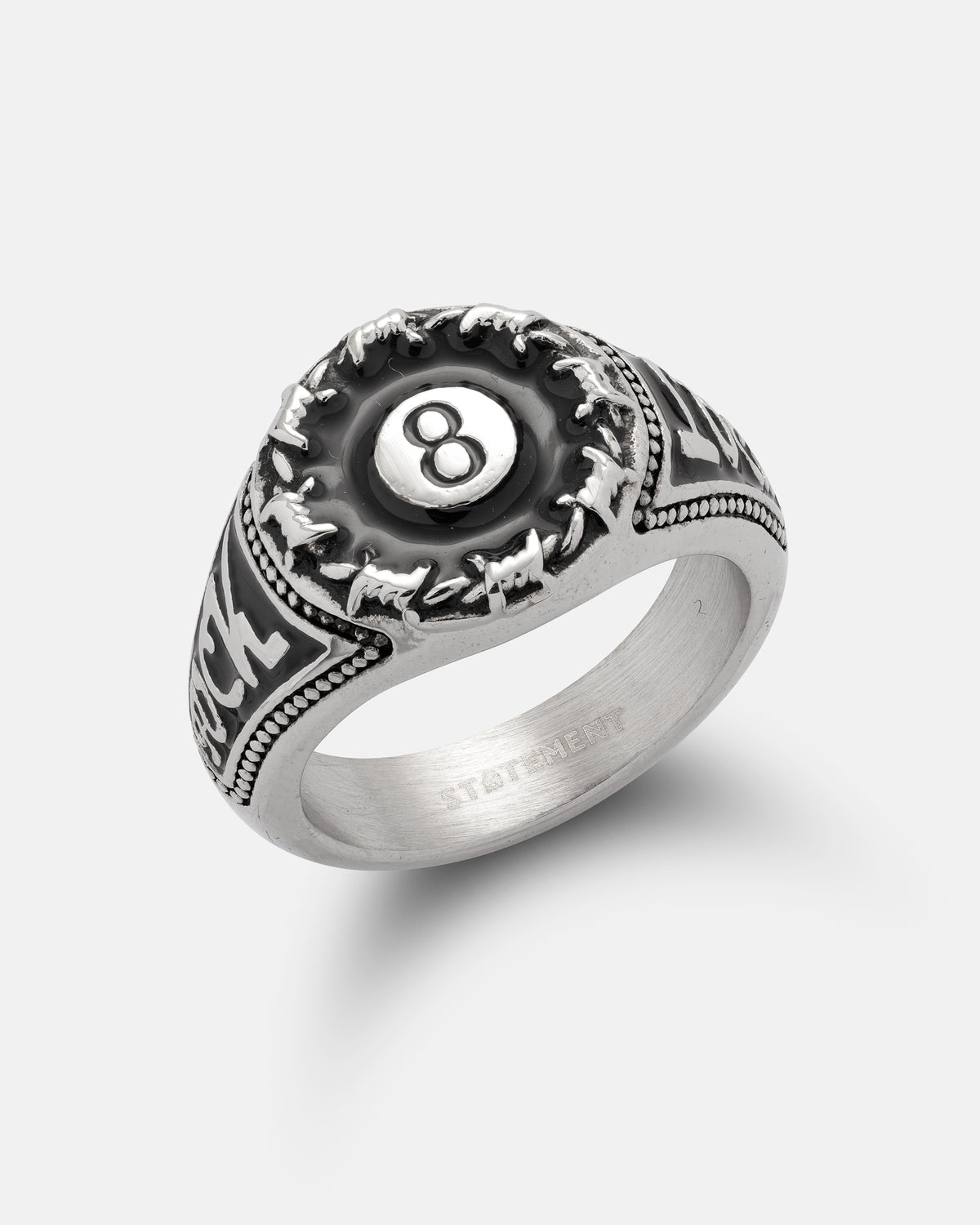Lucky Shot Ring, a stainless steel signet ring featuring a black eight ball surrounded by barbed wire.