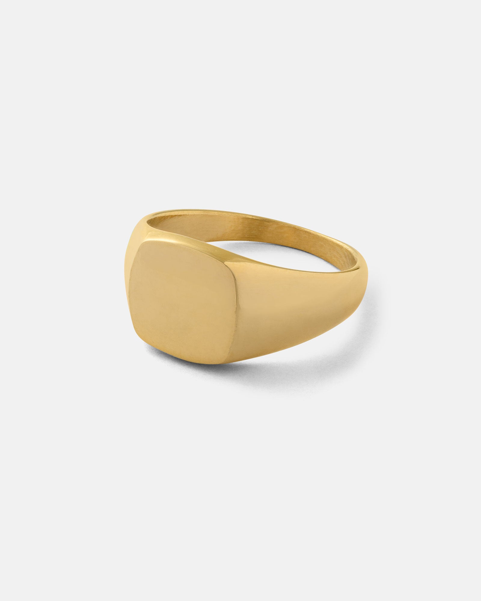 The Minimal Signet Ring (Gold) features a flat, rectangular face with a smooth, polished finish in plain gold, shown on a white background.