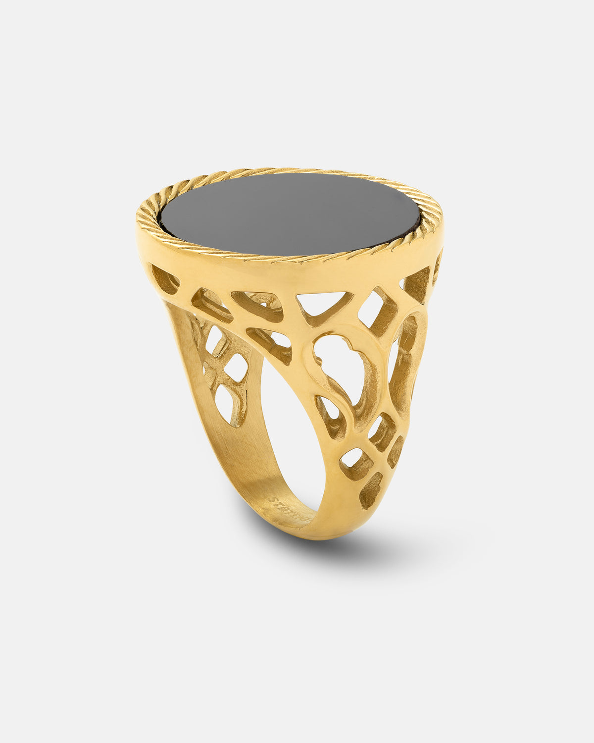 Statement Collective Onyx Sovereign Ring (Gold) featuring a flat, circular black onyx stone set in a twisted rope border, with a cutout lattice design on the band that evokes gothic cathedral jewelry.
