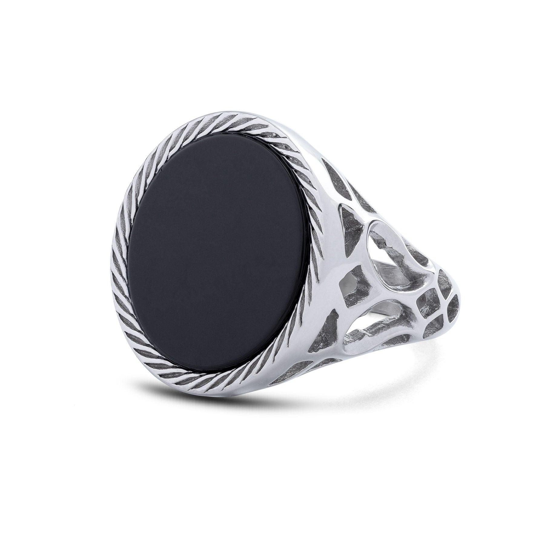 Silver ring with a black onyx stone on a white background by statement collective
