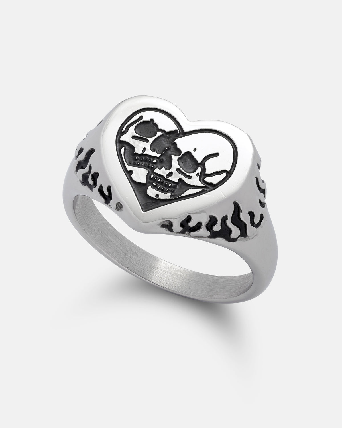 The STATEMENT Skull Heart Ring features a heart-shaped face with two skulls set inside, while the band is adorned on both sides with an intricate black flame design. This bold piece of gothic jewelry brings an edgy flair to your collection.