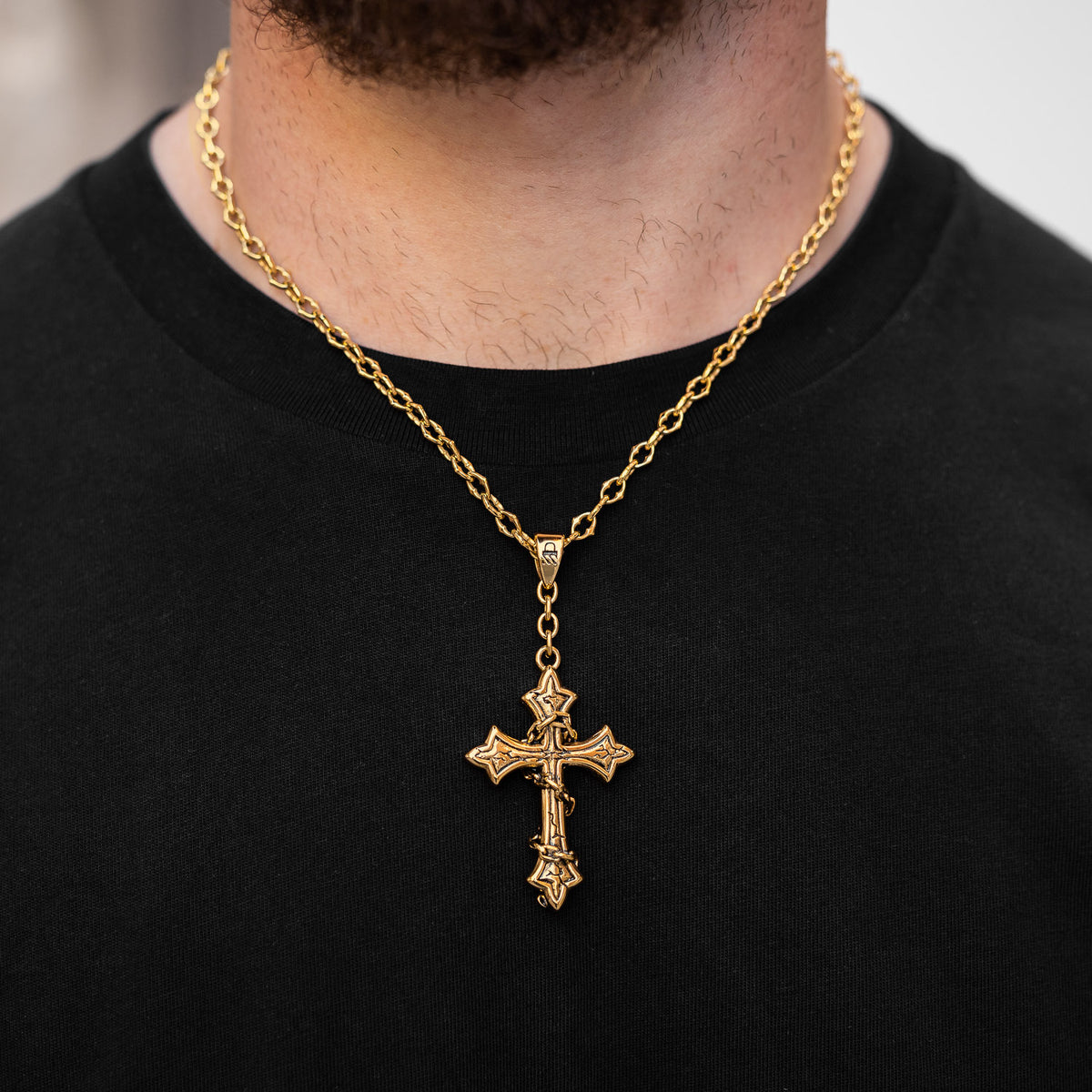 large gold cross pendant necklace with spiked chain
