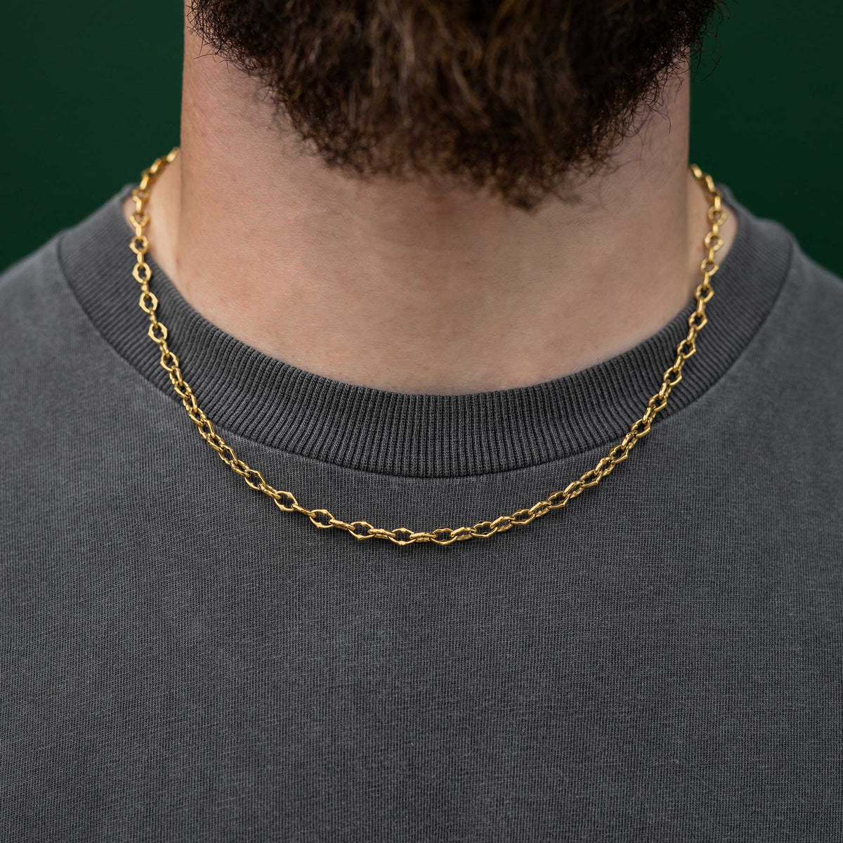 Spikey chain necklace on male neck by statement