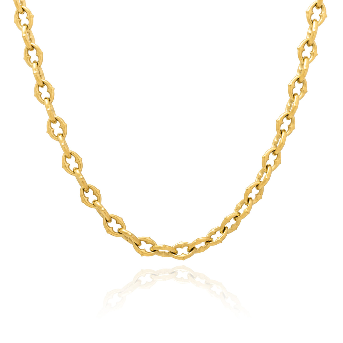Thick gold spiked chain on white