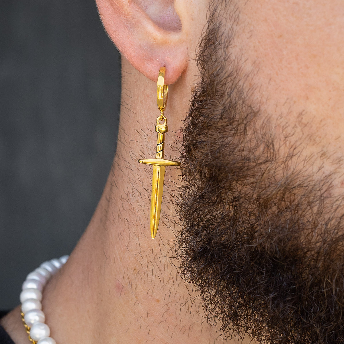 mens dagger earring by statement collective