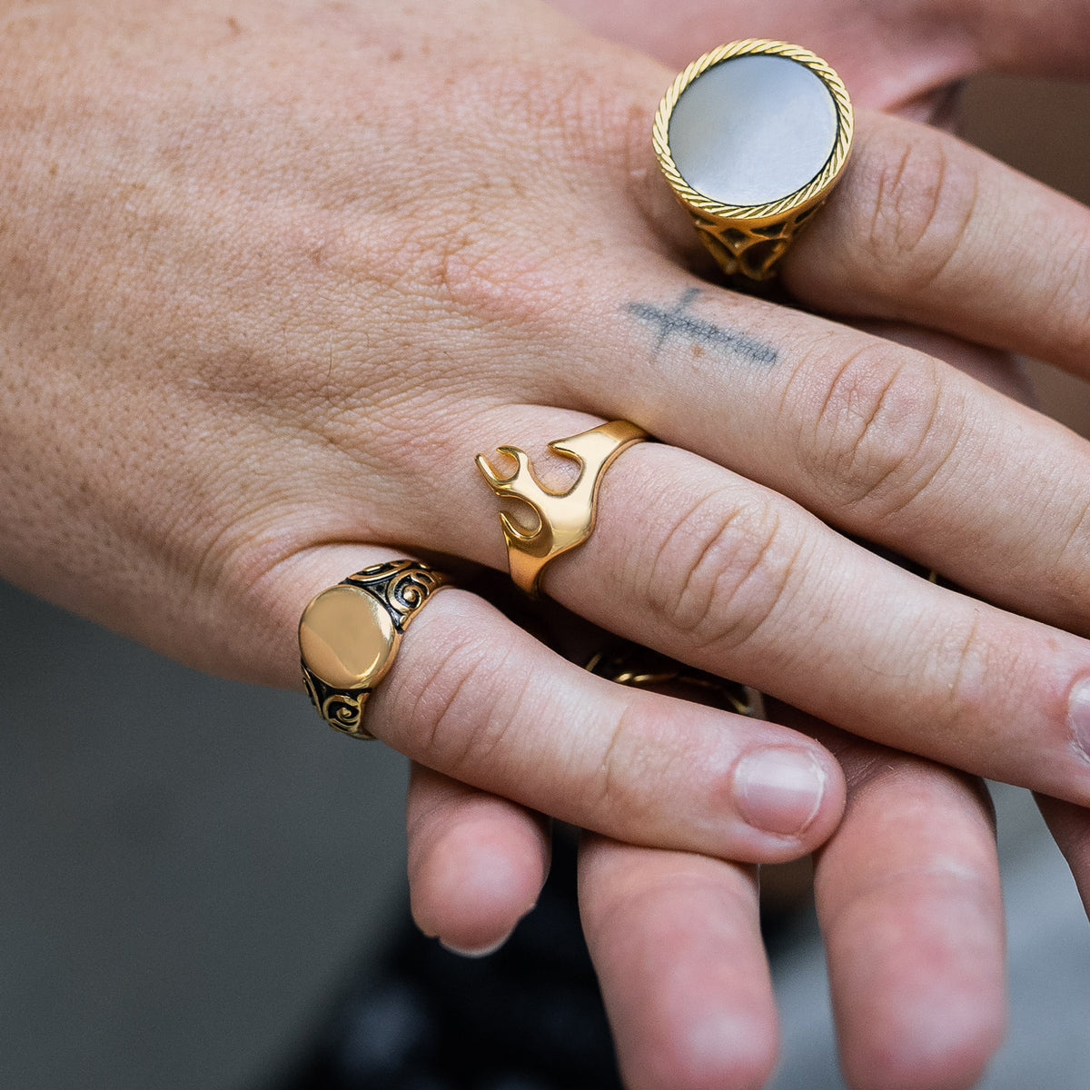 mens flame ring in gold on model