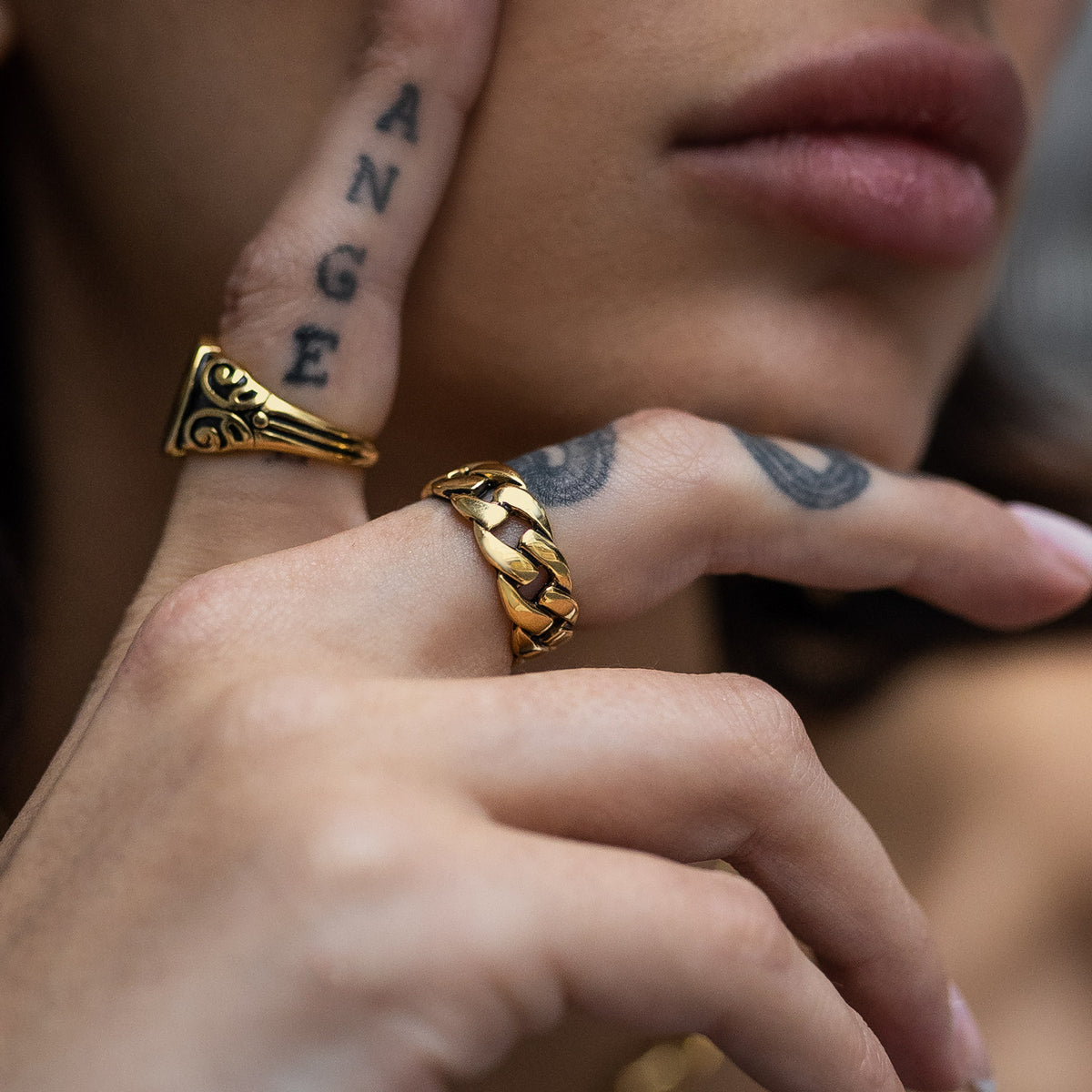 womens gold cuban ring on model