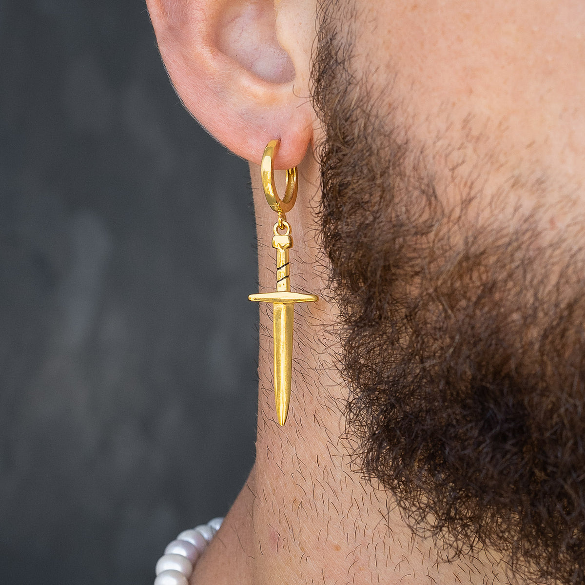 dagger earring in 18k gold