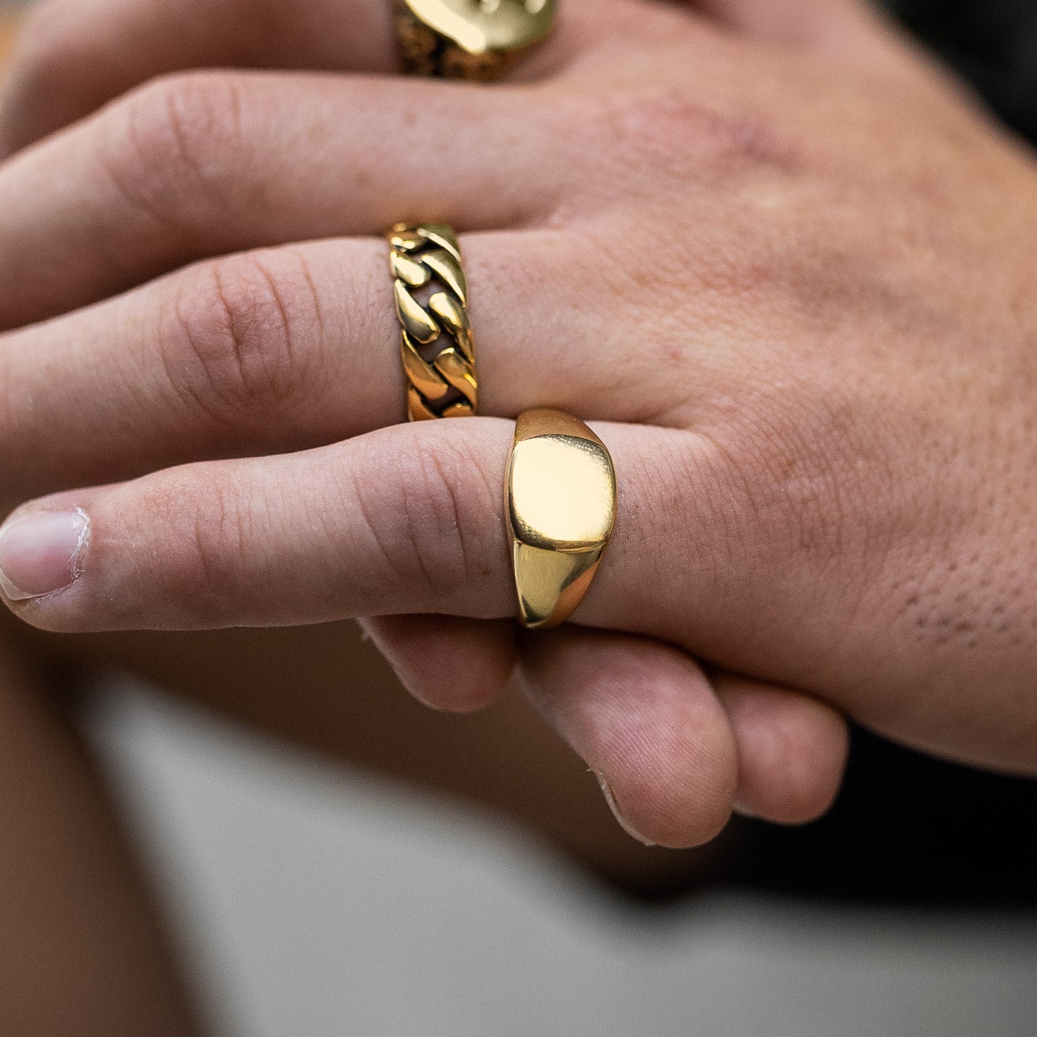 Mens minimalist signet ring on model