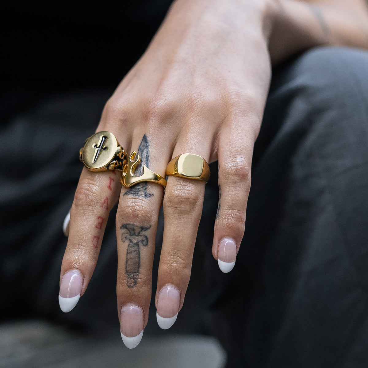 gold minimal signet ring on female by STATEMENT