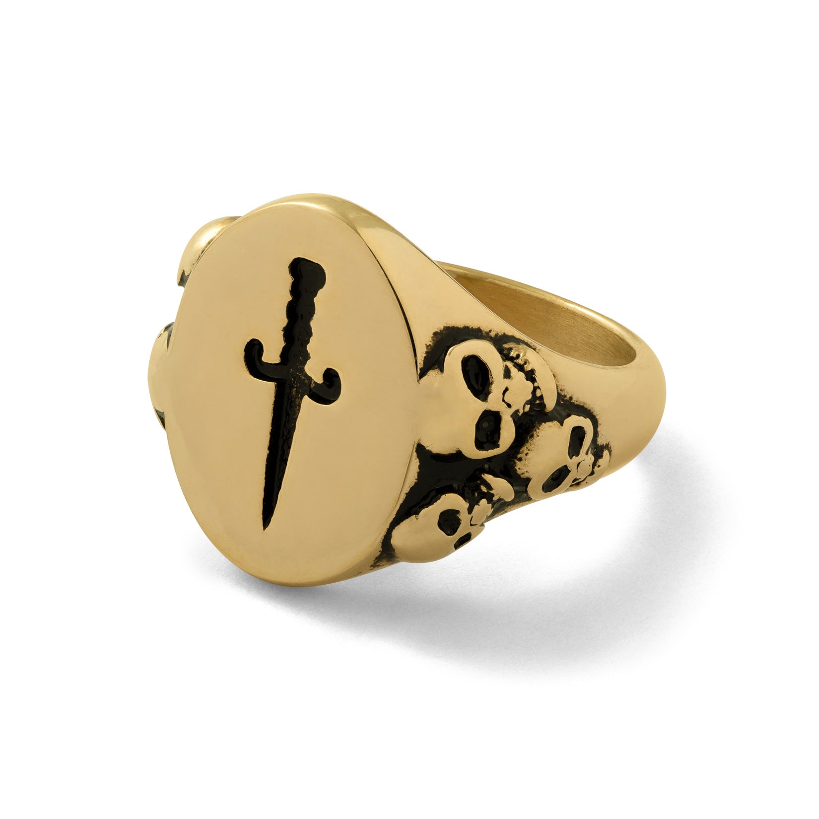 Gold dagger and skull ring by STATEMENT