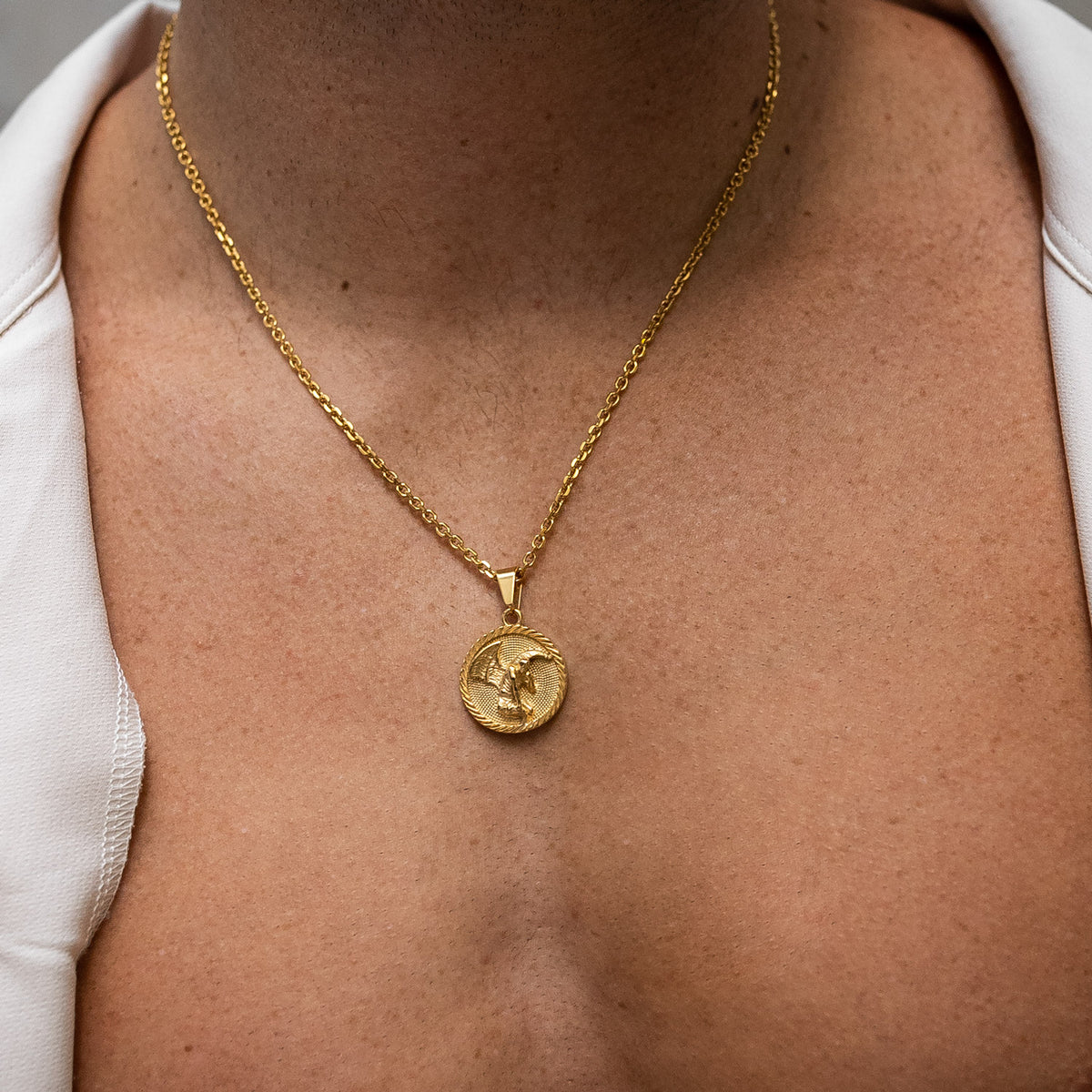 Mens medallion pendant in gold by statement