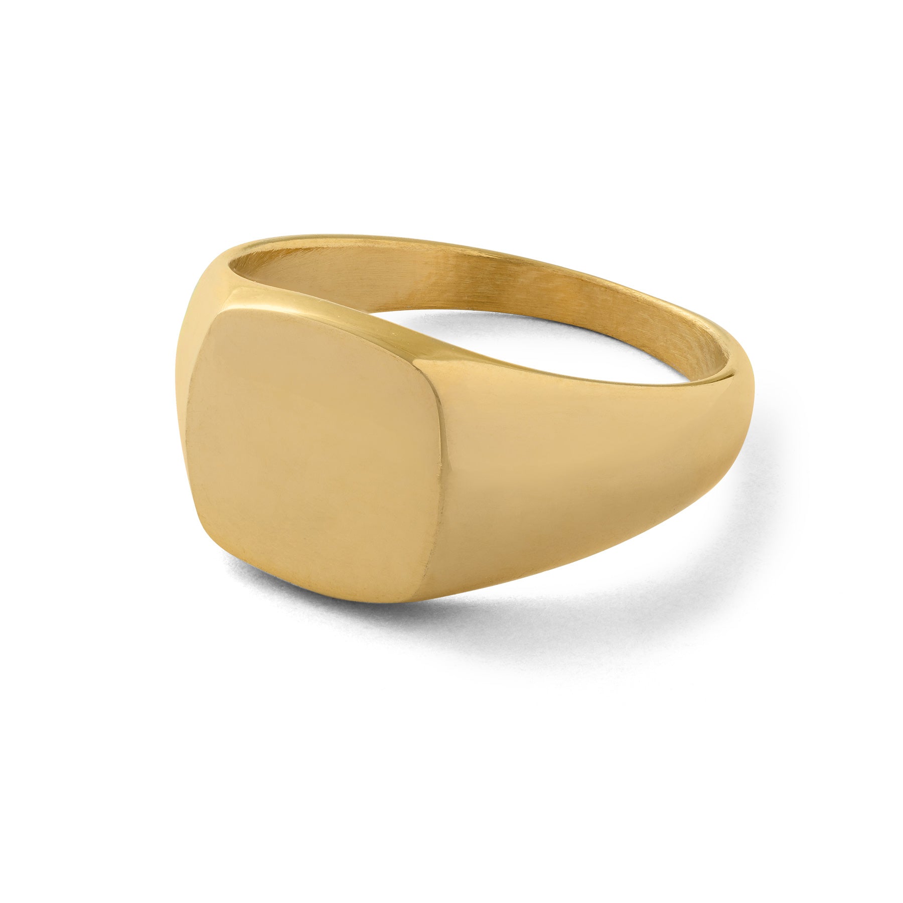 Statement minimalist gold signet ring on white background