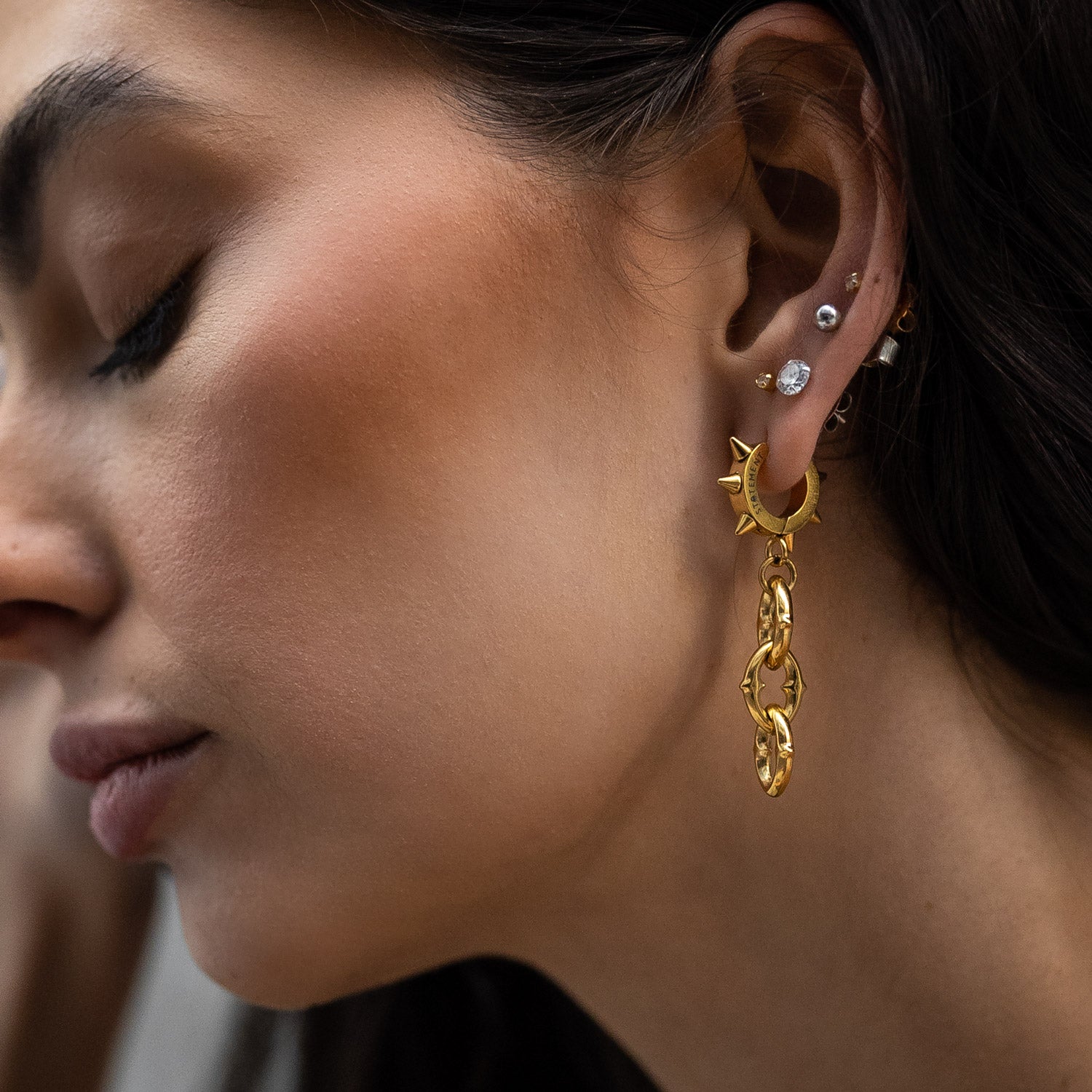 womens gold dangle earrings by statement collective