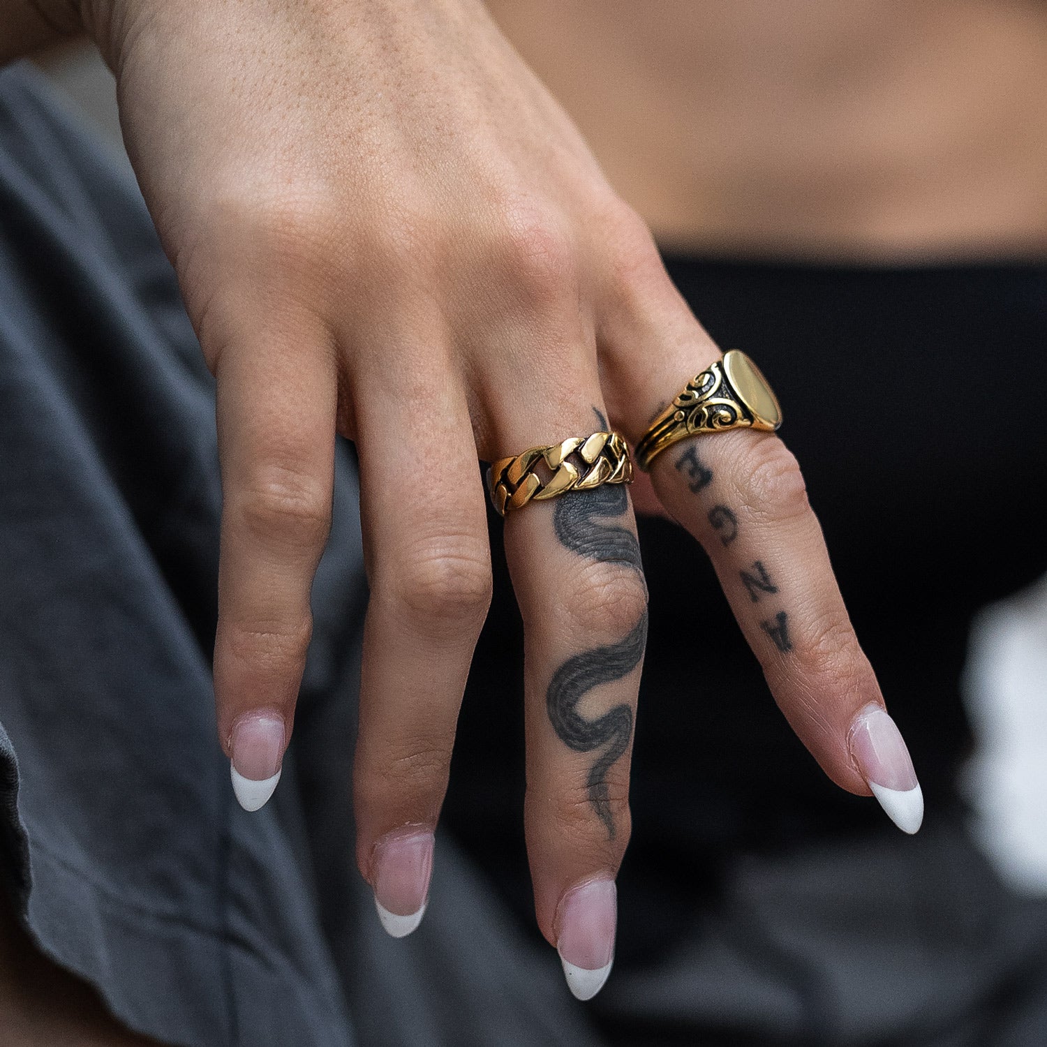 cuban link ring in gold on body